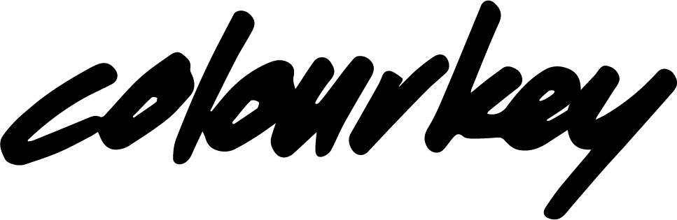 "Schriftzug 'colourkey' in schwarzer, geschwungener Schrift."